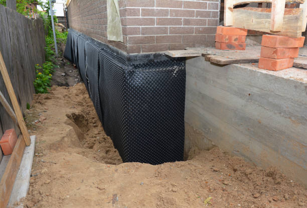 Happy homeowners after waterproofing job in Allenhurst